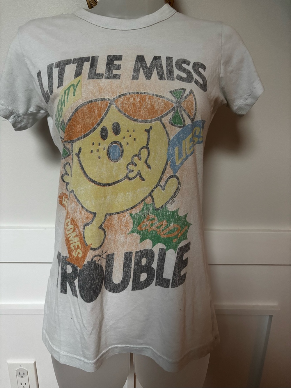 Y2K "Little Miss Trouble" graphic baby tee by Junk Food . Roger Hargreaves